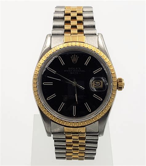 rolex oyster perpetual date gold black